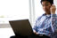 man on computer